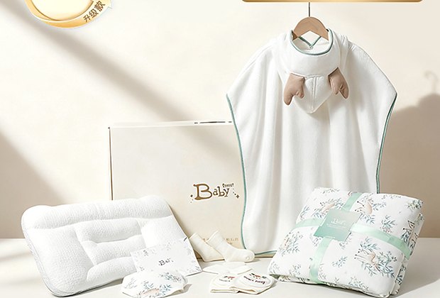 Baby textile gift set with apparel pillow and packaging display