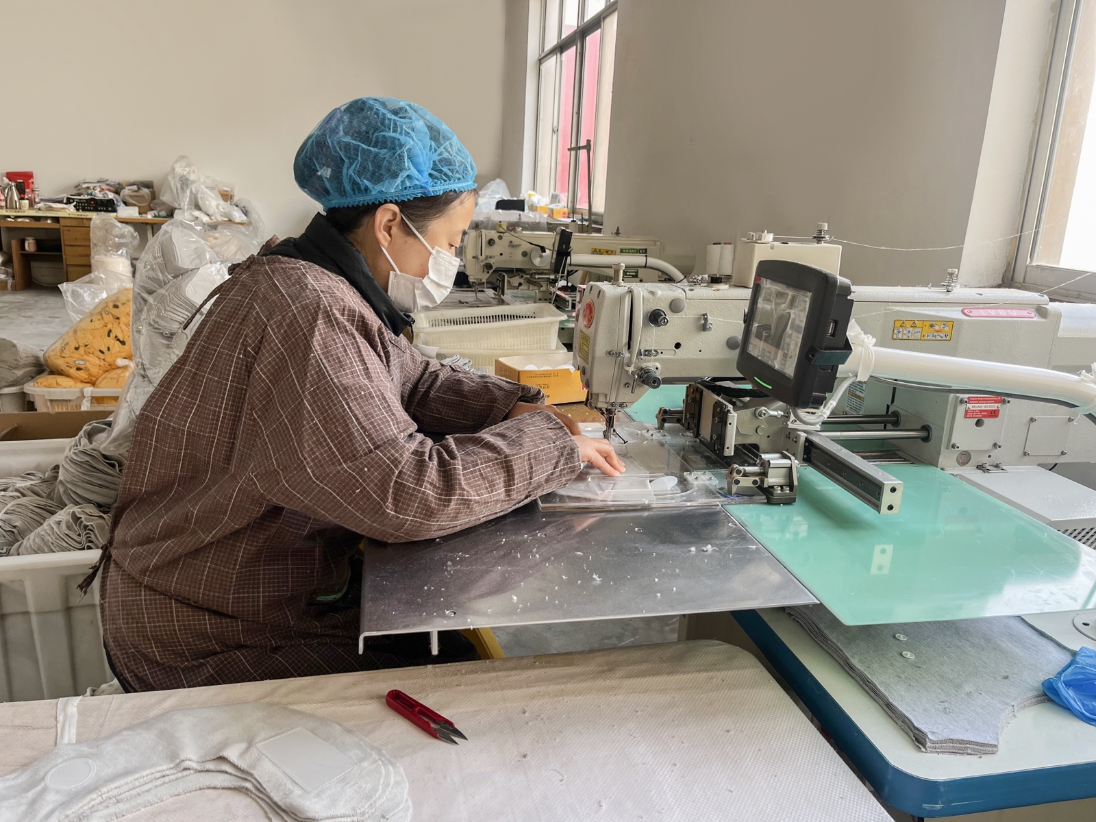 Factory sewing machine process for baby lounger production