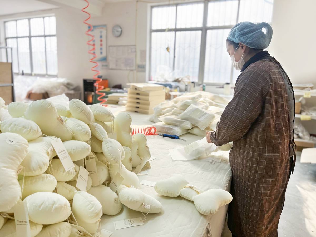 Baby textile products arranged for inspection and packing