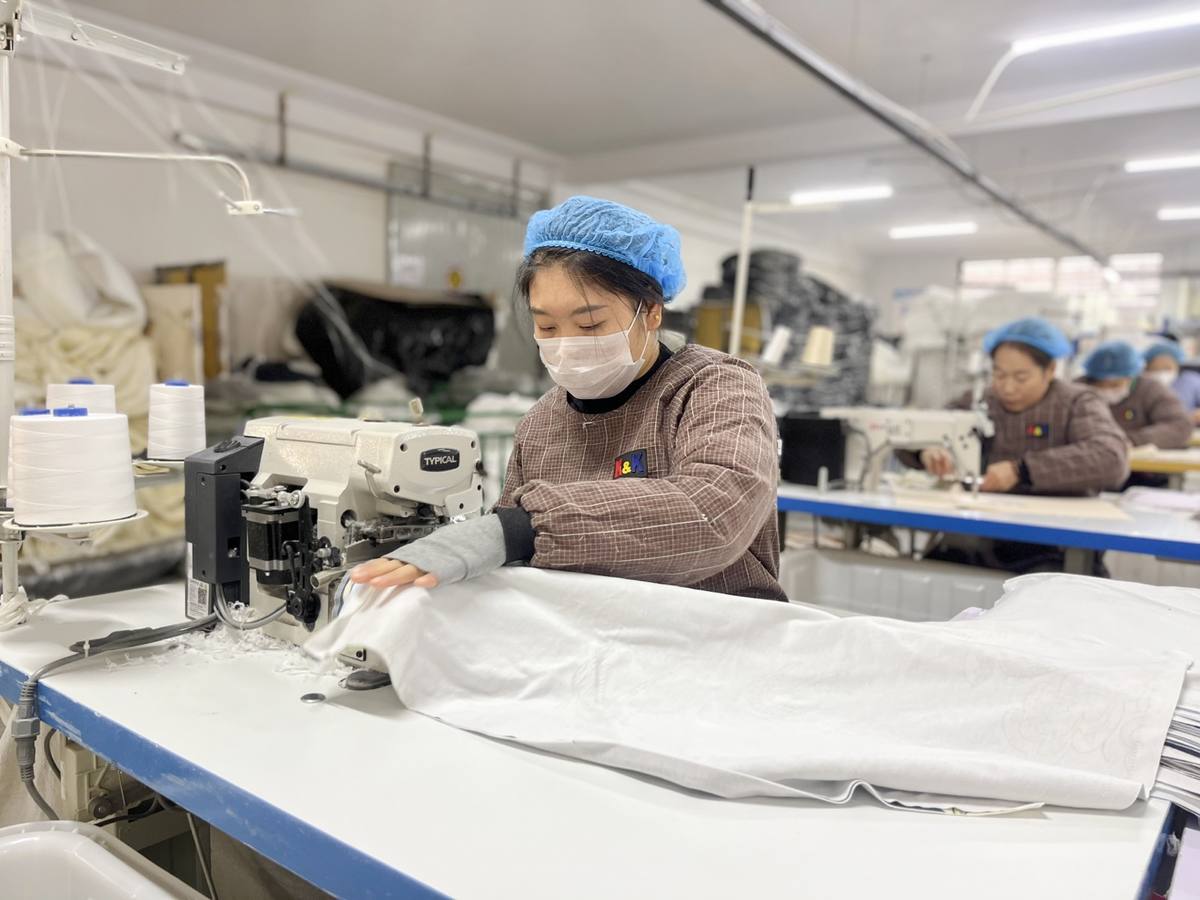 Sewing workshop production for OEM baby textile orders